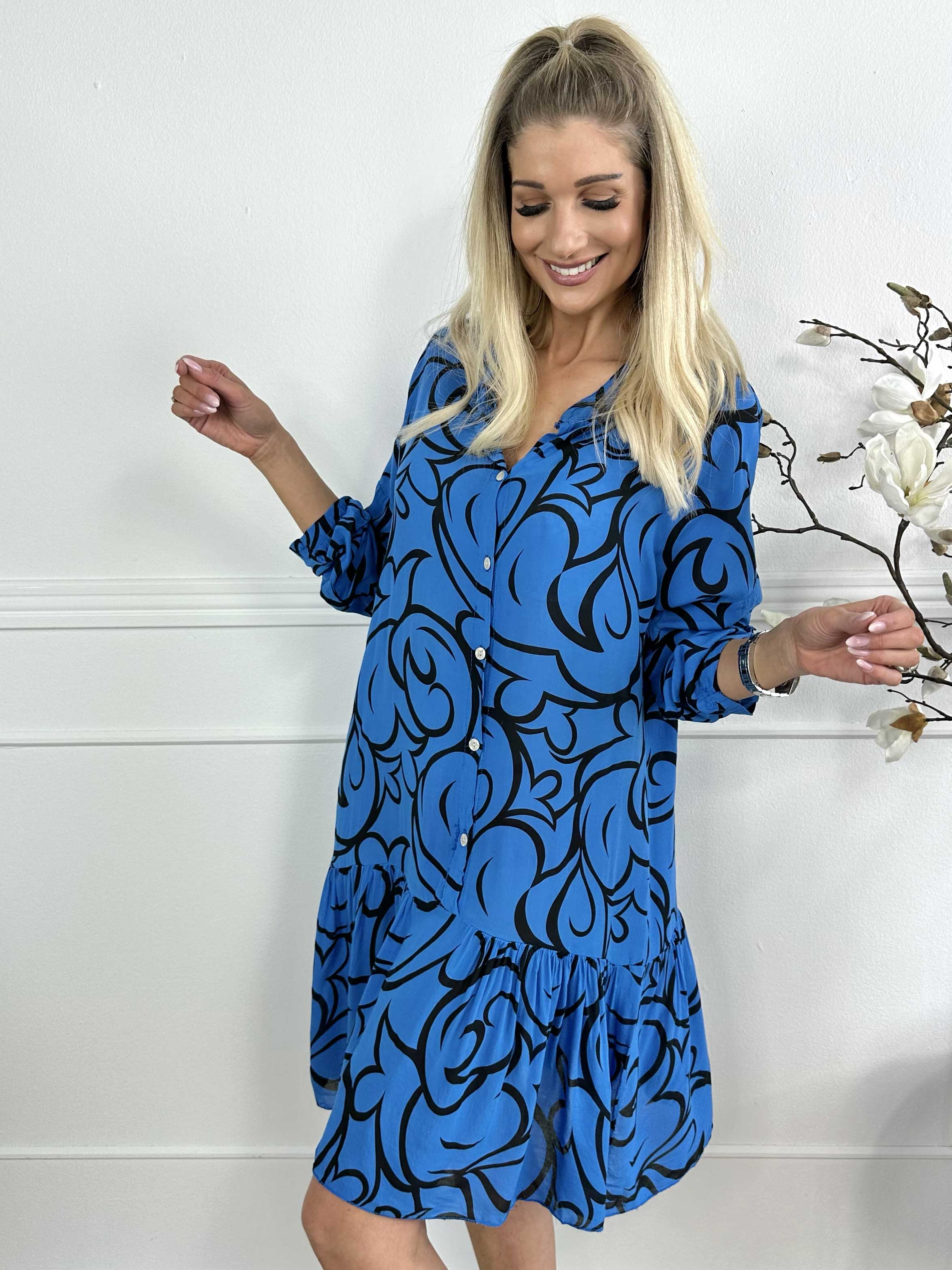 Linda - Mönstrad skjortklänning med volang i nederkant